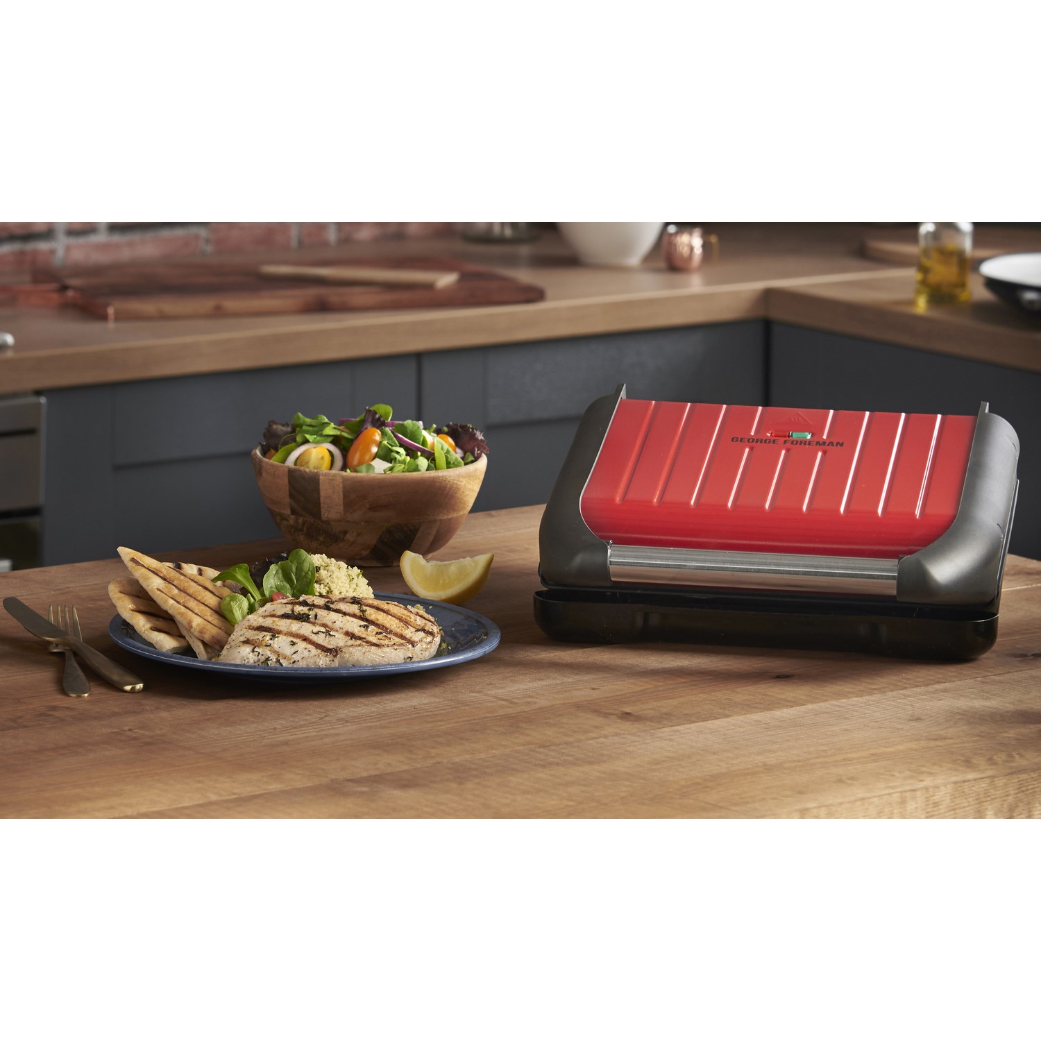 Foreman Small Red Steel Grill In A Bold Striking Stainless Steel